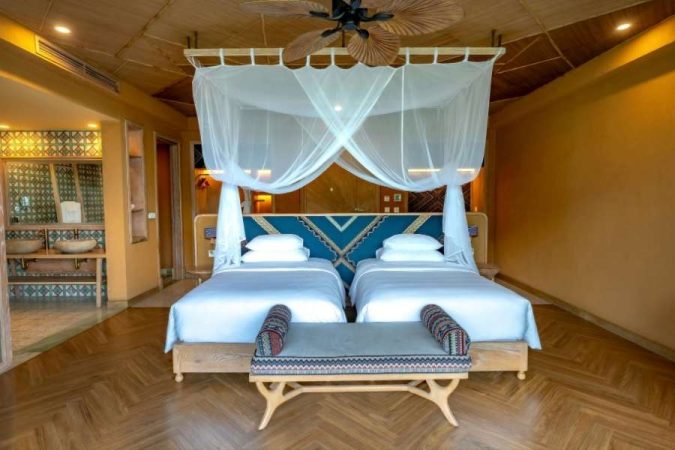 Une chambre élégante pour bien choisir hébergement durant des vacances au calme.